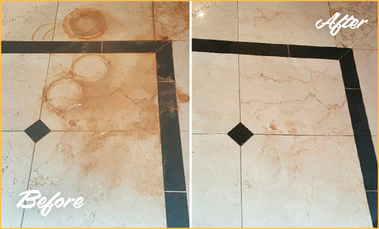 Before and After Picture of a Calistoga Hard Surface Restoration Service on a Marble Floor to Eliminate Rust Stains